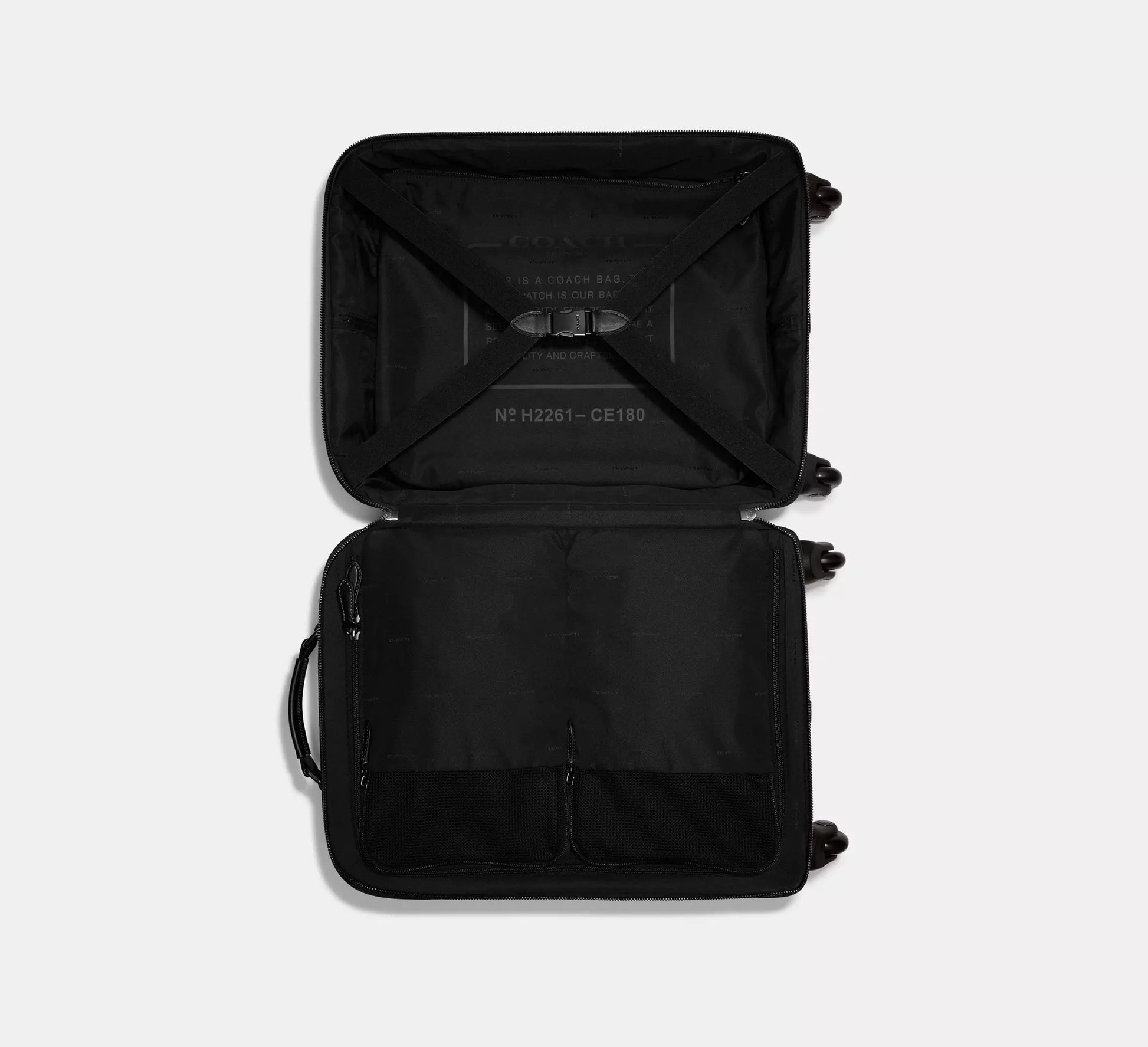 Coach Wheeled Carry On In Signature Canvas